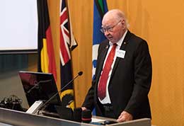 Uncle Lewis O'Brien speaking at a podium