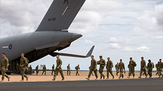 Australian Army soldiers from 5Th Battalion, Royal Australian Regiment, Exit A No 36 Squadron C-17A Globemaster Iii Aircraft after arriving at RAAF Base Curtin in northern Western Australia on 31 August 2016 for Exercise Northern Shield. © Commonwealth of Australia, Department of Defence.