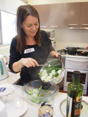 Researcher Dr Natalie Parletta cooks a healthy meal. 