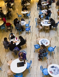 elevated view of people in a open cafe