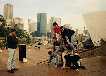 Matthew Walker and his UniSA classmates forming a human pyramid in front of Sydney Opera House