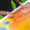 This artwork is one of four pieces created during UniSA’s Reconciliation Week celebrations in 2014. Aboriginal artist Chris Ackland worked with UniSA students to create a piece at each metropolitan campus. Together, the four pieces form a larger work depicting South Australia through the use of traditional Aboriginal dot painting and other contemporary techniques. Photo: Juan Photography.