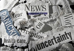 newspaper clippings depicting uncertain times