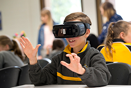 Student wearing virtual reality technology
