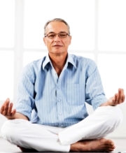 Mature man practising transcendental meditation
