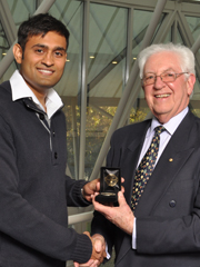 Dr Satyajit receiving the Michael Miller Medal from Professor Michael Miller