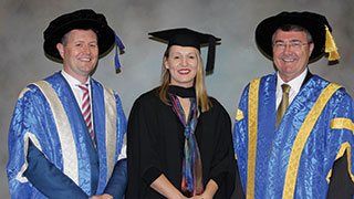 Sally Perrin with Vice Chancellor Professor David Lloyd (left) and Chancellor Jim McDowell.