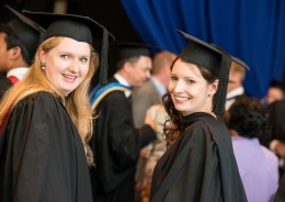 New graduates in caps and gowns