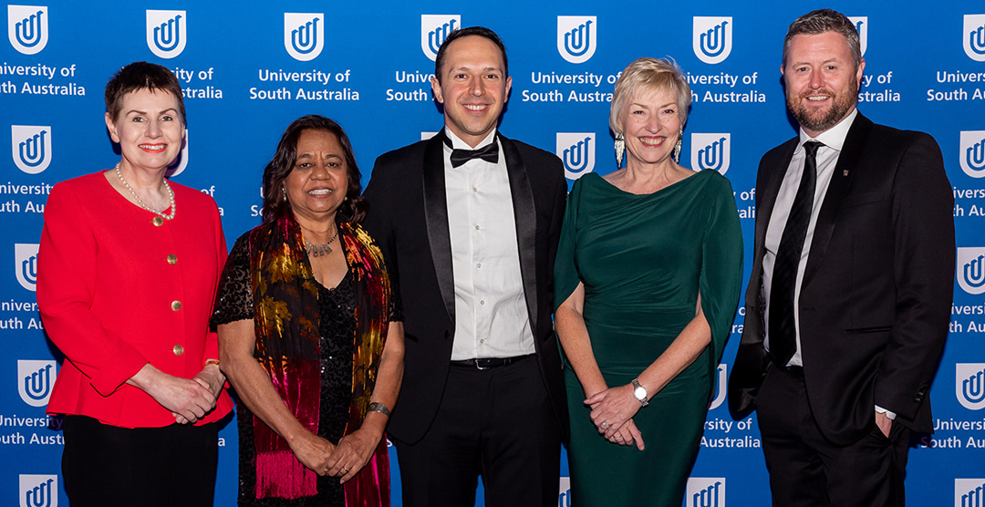 From left: University of South Australia Chancellor Pauline Carr with Alumni Award recipients Henrietta Marrie AM, Arman Abrahimzadeh OAM, Elaine Bensted, and Vice Chancellor and President Professor David Lloyd
