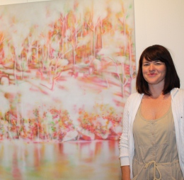 Winner of the Fleurieu Art Prize Fiona Lowry with her landscape painting