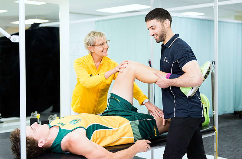 An athlete receiving physiotherapy