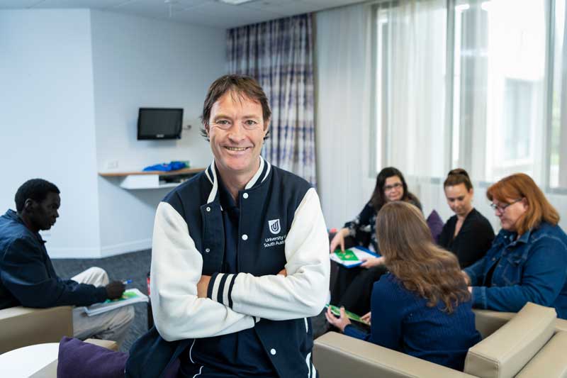Teacher smiling in a classroom
