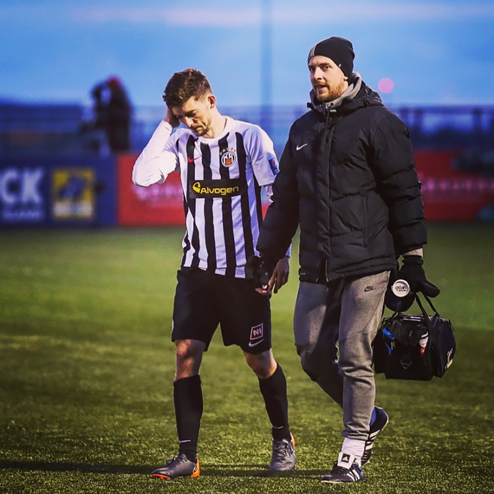 Valgeir (right) and fellow KR Football Club player after a game. Source.