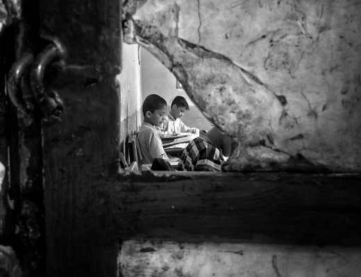 Two boys sitting together