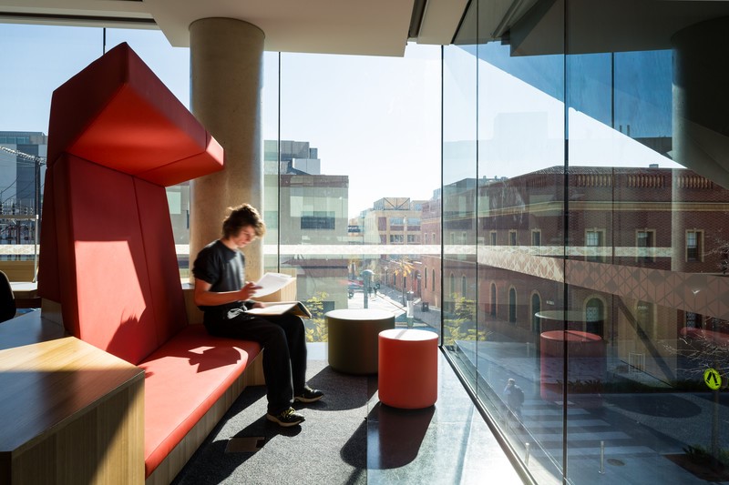 Student in City West campus library