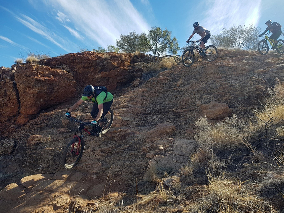 Riders on a mountain bike trail