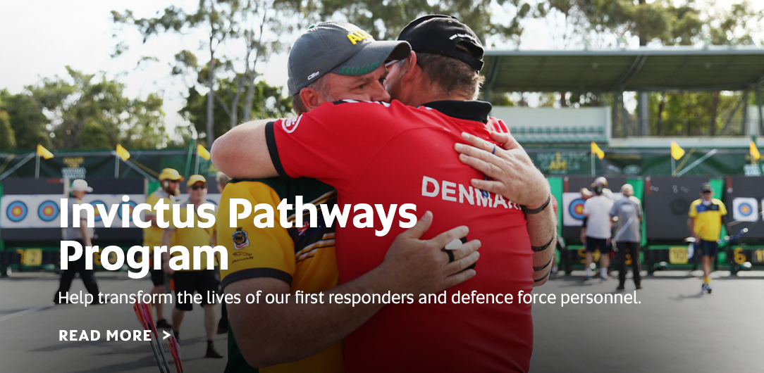 Two men hugging after competing in an archery tournament, text overlay: Invictus Pathways Program