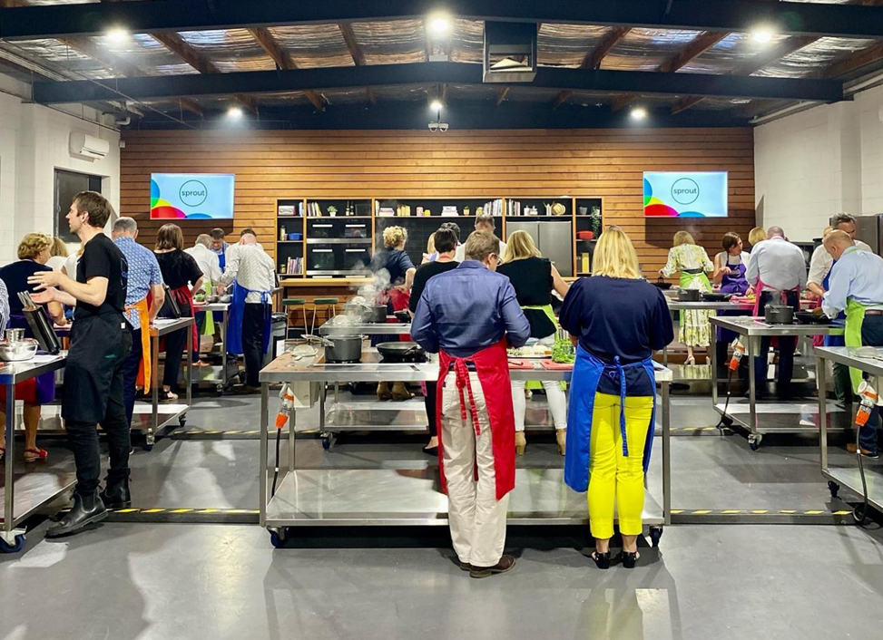 People participating in the Sprout cooking classes