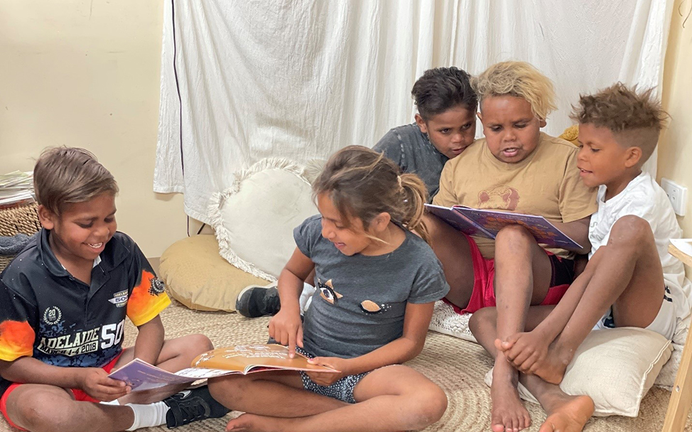 Hector, Marika, Gabriel, Malcolm, Michael at the Yalata Anangu School. Hector (Year 3): “I like the book because the dogs do cheeky stuff, same as the dogs in Yalata.” Michael (Year 4): “It’s funny and I like reading Pitjantjatjara words."