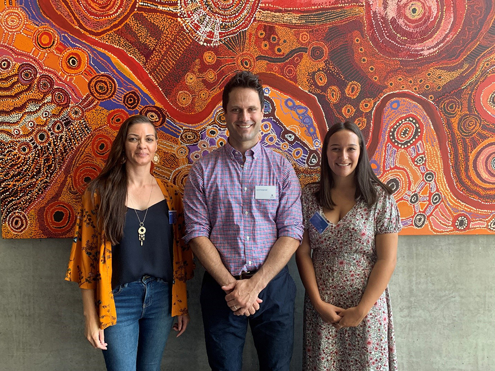 Gavin Wanganeen (centre) with recent scholarship recipients Skye and Hayley.