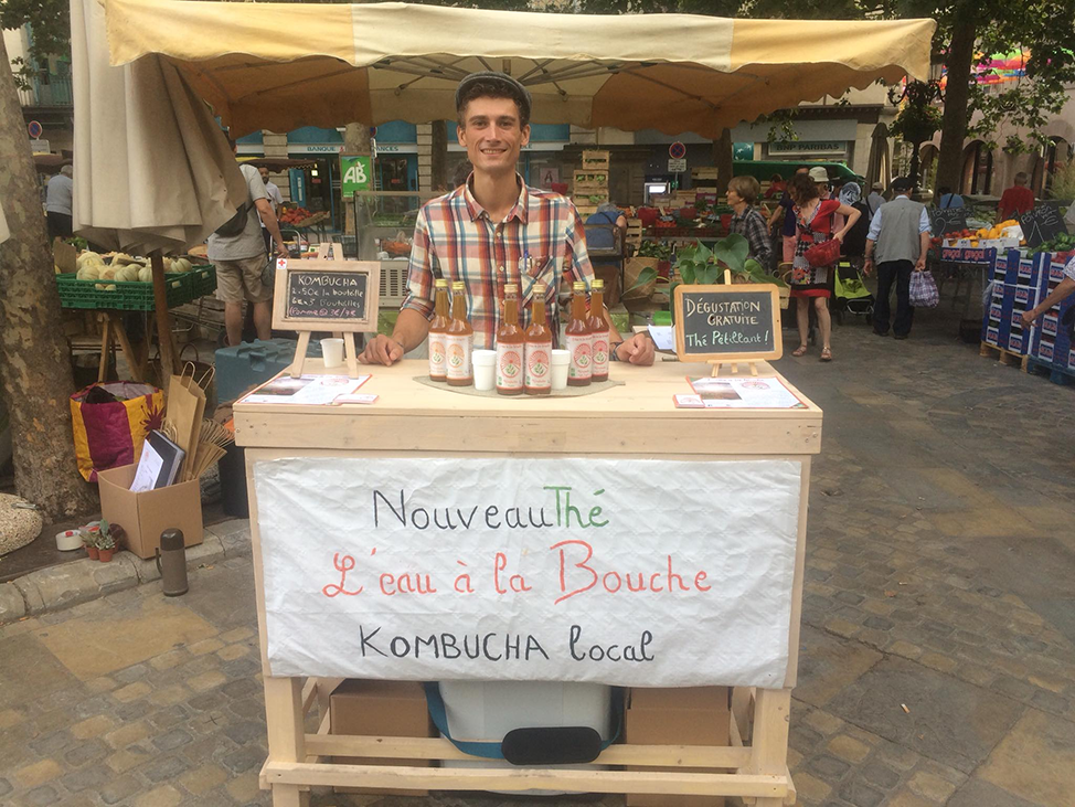 Justin Tarlier-Doecke selling Kombucha at a local market