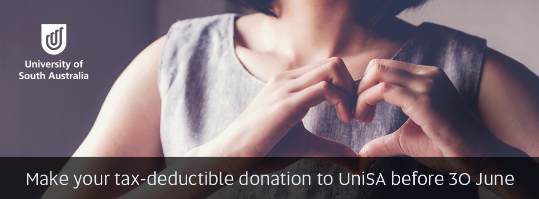 Woman making the shape of a heart with her hands, text overlay: 'Make your tax-deductible donation to UniSA before 30 June