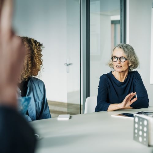 Woman-boardroom-GettyImages-1342429241.jpg