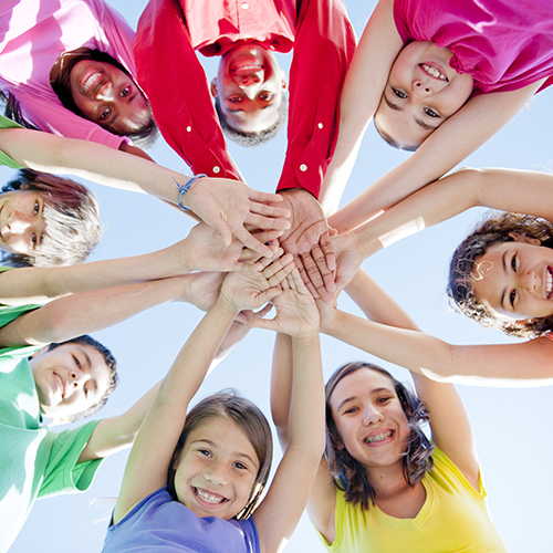 smiling kids in a circle