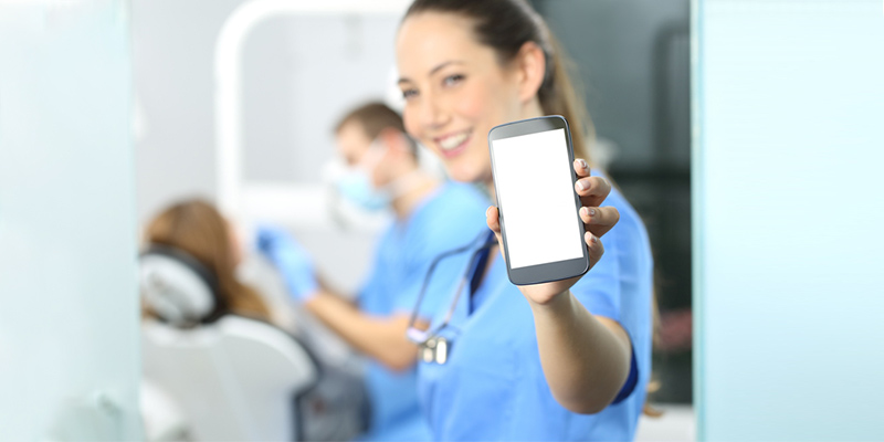 Nurse managing medications on a smartphone