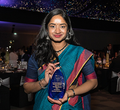 Mytheli with her award.