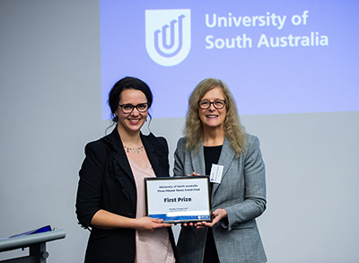 UniSA 3MT Grand Final Winner 2019, PhD candidate Ellen Davies, pictured with Professor Caroline McMillan, Chief Scientist of South Australia.