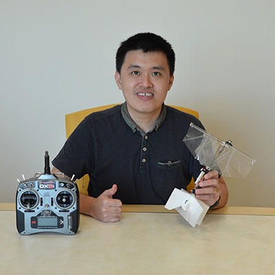 Dr Yao-Wei Chin with the flapping wing drone prototype.