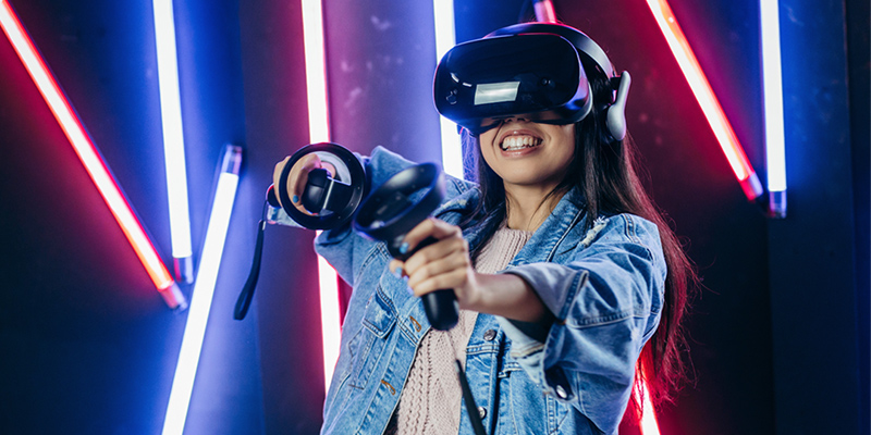 Girl playing a virtual reality game