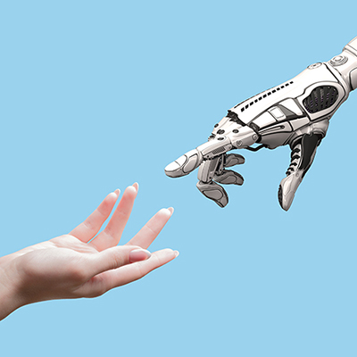 Human hand reaching out to robot hand