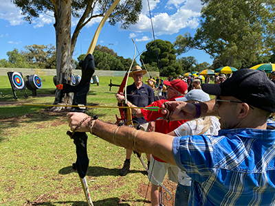 Invictus Pathway Program participants and their families taking part in the Veterans Family Archery Day, organised by Veteran Sport Australia.