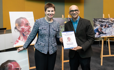 UniSA Chancellor Pauline Carr with Dr Arjun Burlakoti, who won first prize in the teaching category for his image, Drawing head and neck.