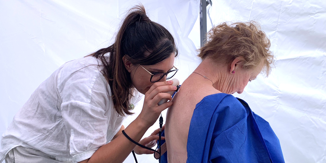 A nurse undertaking skin cancer checks using AI in a pop-up clinic at Victor Harbor.
