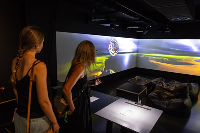 Immersive exhibition invites visitors to help mend a broken world ...