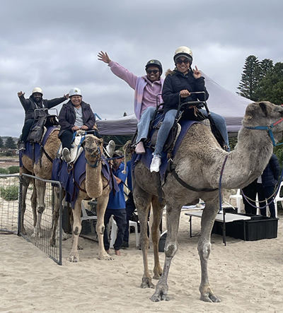 AAPNG participants enjoy local attractions during their stay, including riding camels at Victor Harbor. 
