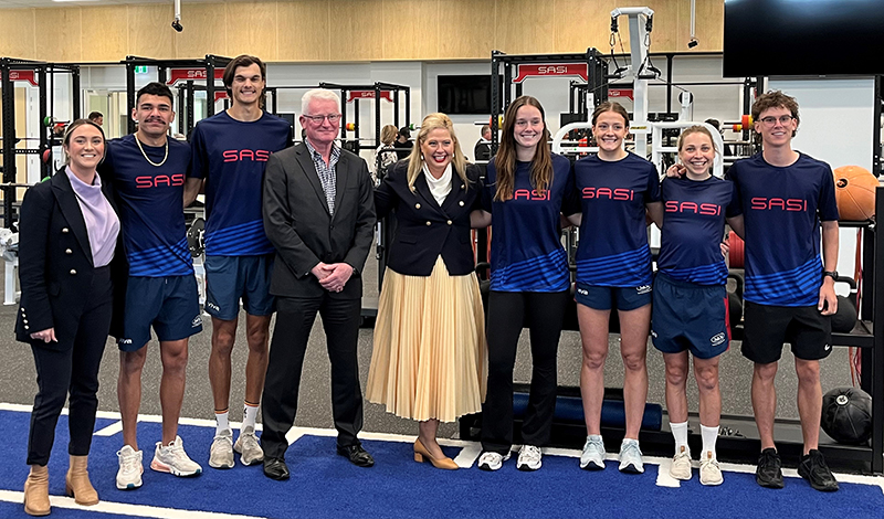 Assistant Minister for Junior Sport Participation (far left) Rhiannon Pearce; UniSA Allied Health and Human Performance Executive Dean (fourth from left) Professor Jon Buckley; and Recreation and Sport Minister (centre) Katrine Hildyard with SASI athletes at the pre-launch of the new sporting facilities in Mile End.